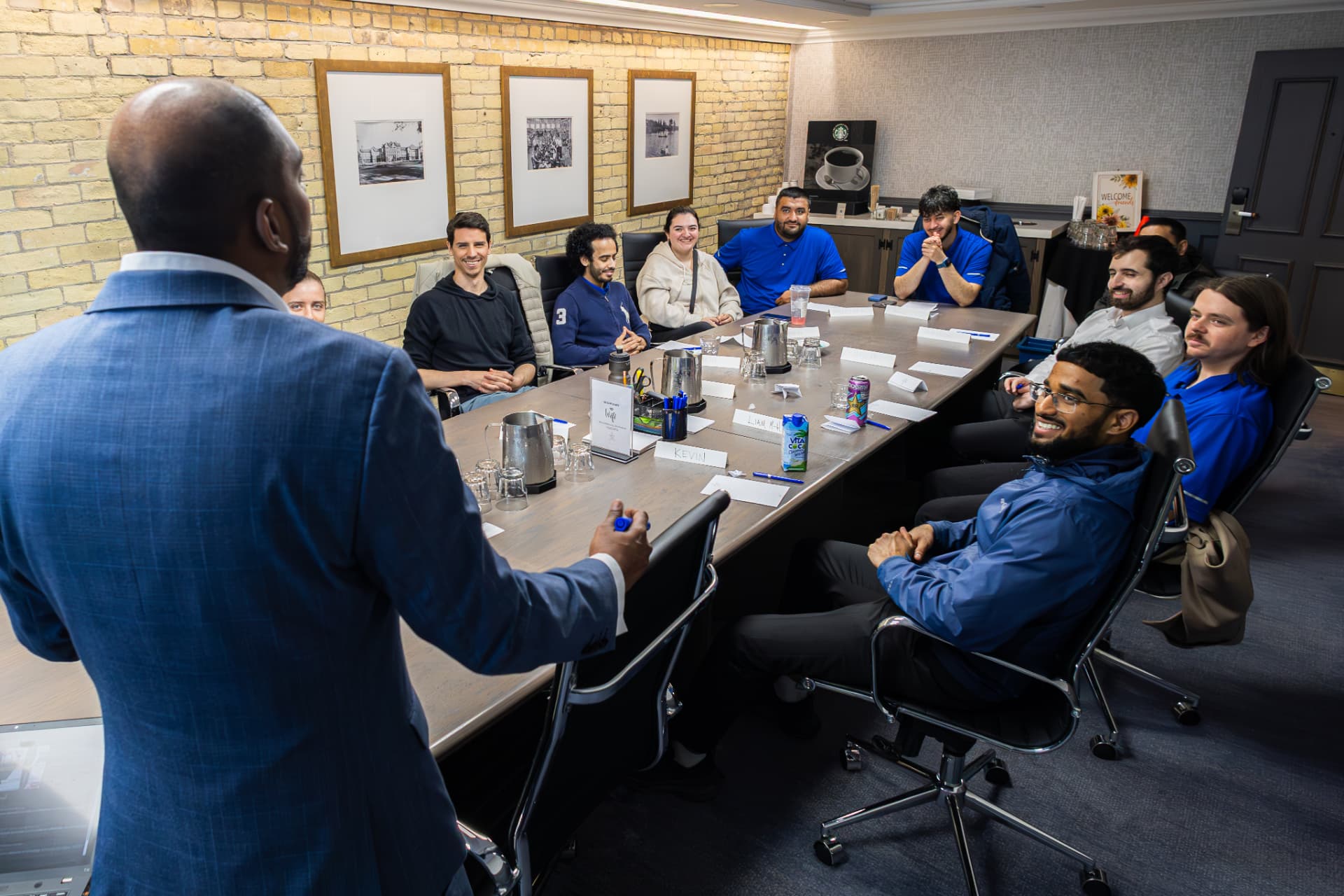 Hospitality staff in a training session at a luxury hotel