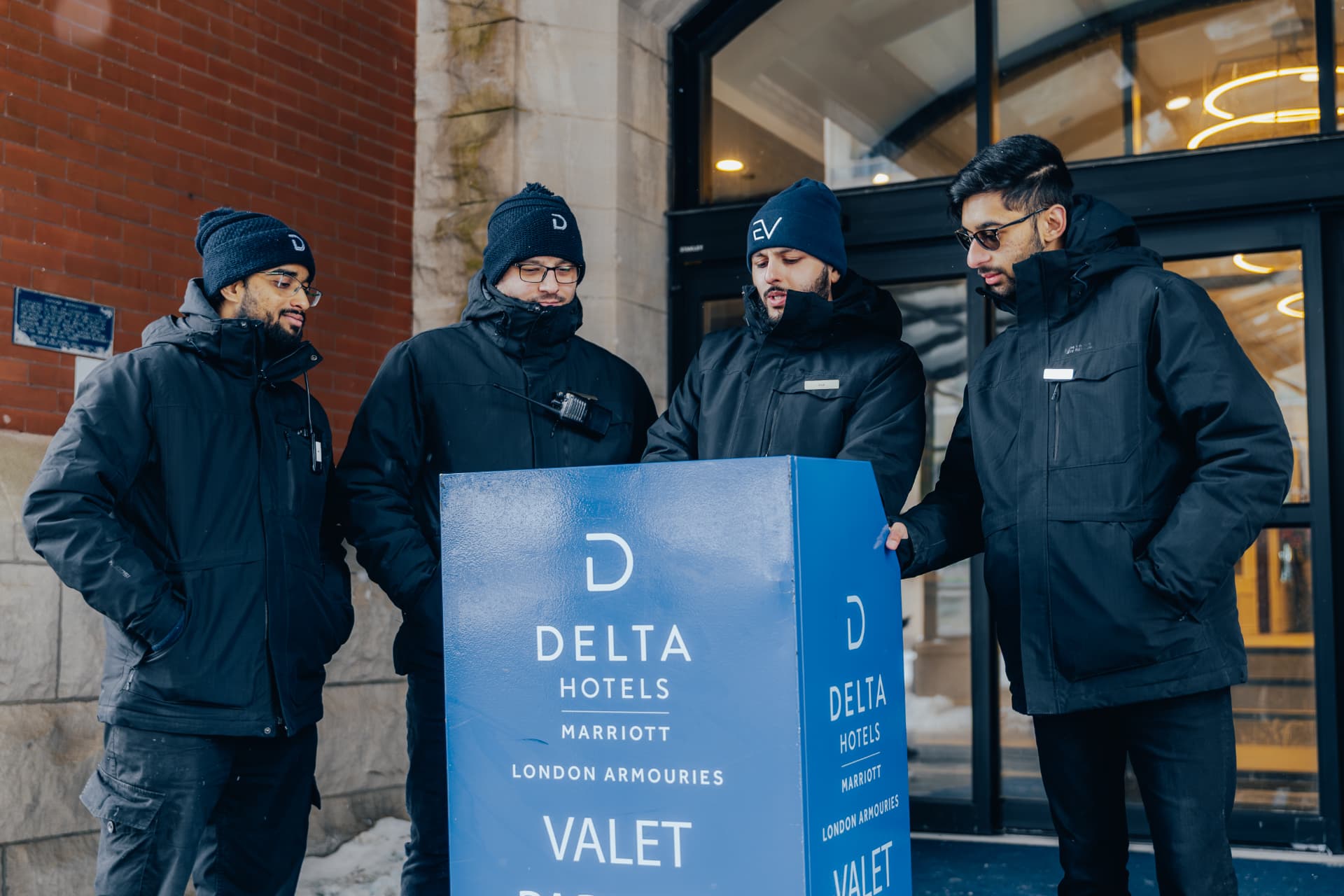 Eminent Valet team at a Delta Hotels valet stand outside the hotel entrance